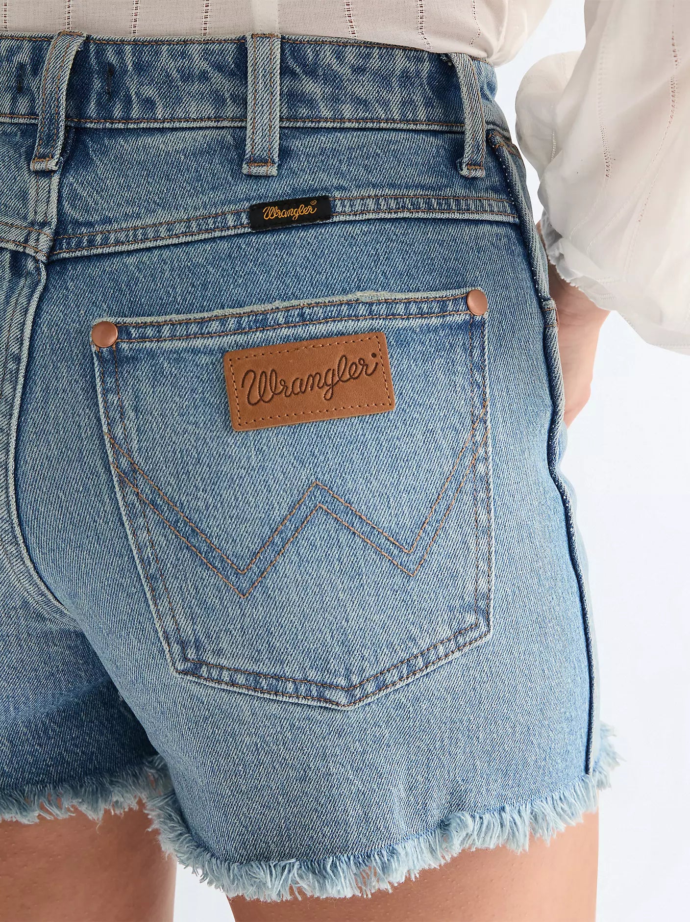 Wrangler Shorts Donna Cowboy 3-inch sfrangiati in denim elasticizzato