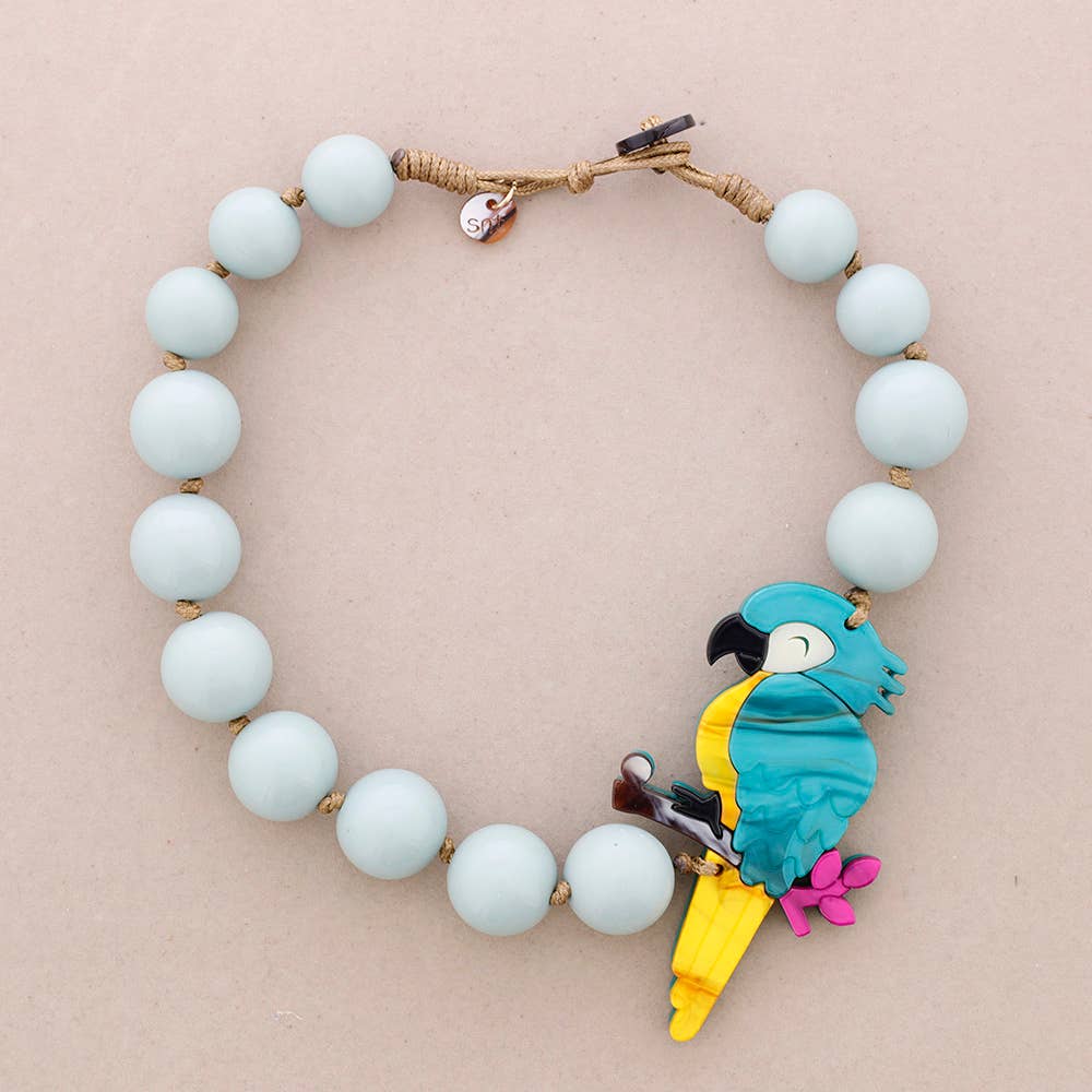 Collana con tre uccelli e perle in resina