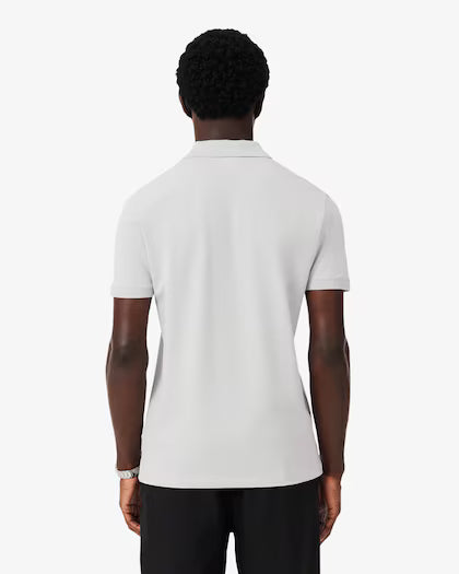 Lacoste · Polo uomo slim piqué logo jacquard grigio