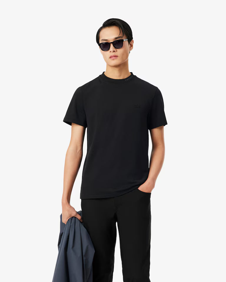 Lacoste · T-shirt uomo piqué jacquard Commuter nero