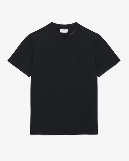 Lacoste · T-shirt uomo piqué jacquard Commuter nero